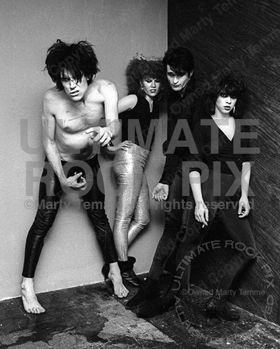 Black and white photo of The Cramps during a photo shoot in 1979 by Marty Temme