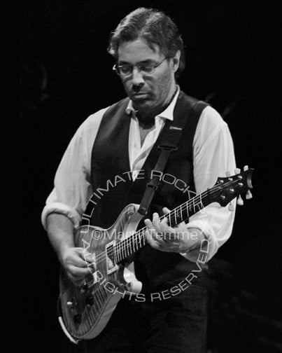Black and white photo of guitar player Al Di Meola in concert by Marty Temme