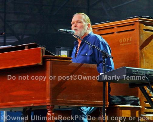 Photos of Musician Gregg Allman of The Allman Brothers Playing Keyboard in Concert by Marty Temme