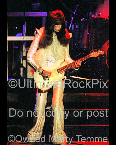 Photo of guitarist Punky Meadows of Angel in concert in 1977 by Marty Temme