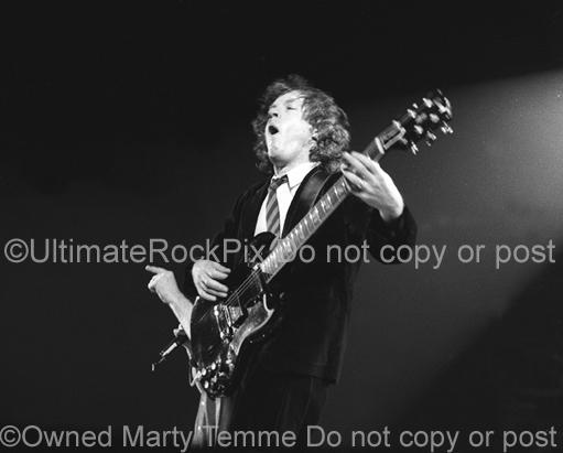 Photos of Angus Young of AC/DC in Concert by Marty Temme