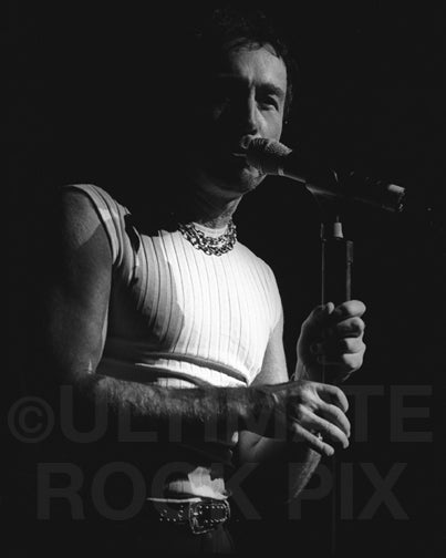 Black and white photo of Paul Rodgers of Bad Company in concert by Marty Temme