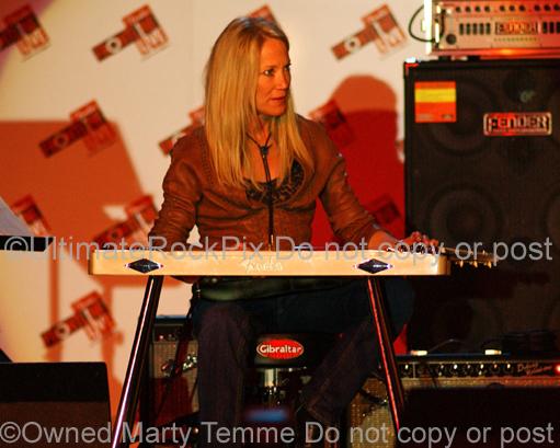 Photo of steel guitar player Cindy Cashdollar in concert in 2008 by Marty Temme
