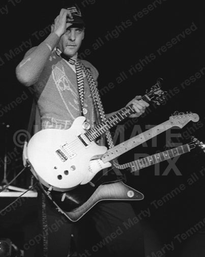 Black and white photo of Rick Nielsen of Cheap Trick in concert in 1979 by Marty Temme
