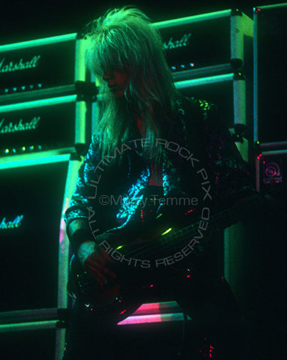 Photo of Eric Brittingham of Cinderella performing in concert in 1989 by Marty Temme