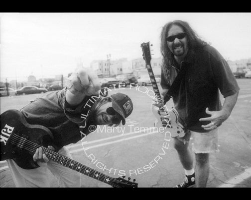 Black and white photo of Pepper Keenan and Woody Weatherman of Corrosion of Conformity during a photo shoot in 1997 by Marty Temme