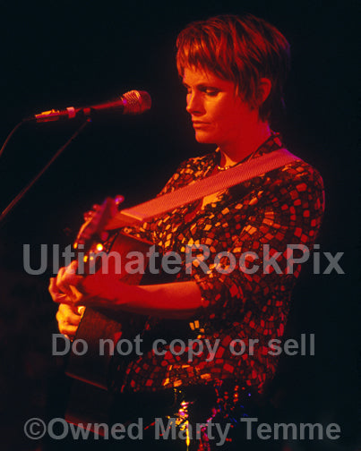 Photo of Shawn Colvin playing a Martin guitar in concert by Marty Temme