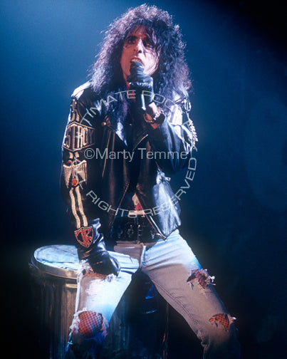 Photo of singer Alice Cooper performing onstage in 1990 by Marty Temme