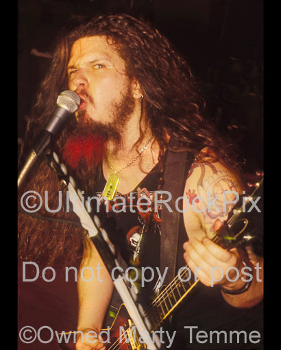 Photo of Diamond Darrell Abbott of Pantera onstage in 1994 by Marty Temme