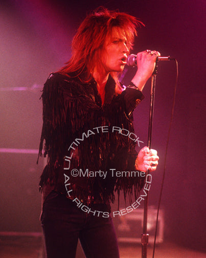 Photo of vocalist Shane of Electric Angels in concert in 1988 by Marty Temme