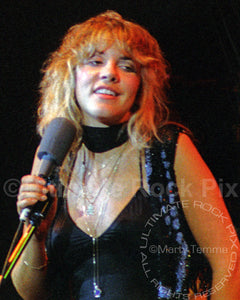 Photo of Stevie Nicks of Fleetwood Mac performing in 1977 by Marty Temme
