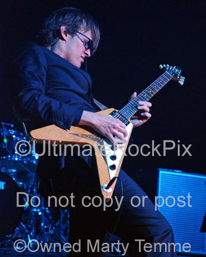 Photos of Joe Bonamassa playing a Gibson Flying V in Concert by Marty Temme