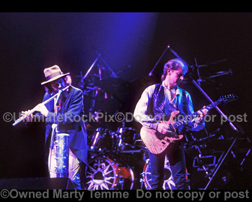 Photo of Ian Anderson and Martin Barre of Jethro Tull in concert in 1989 by Marty Temme