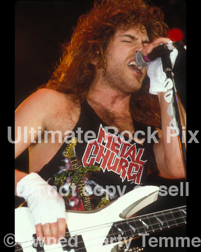 Photo of musician Kip Winger in concert in 1989 by Marty Temme
