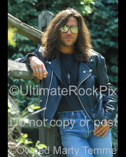 Photo of Kip Winger wearing sunglasses during a photo shoot in 1993 by Marty Temme