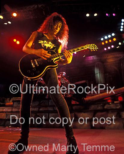 Photos of Kirk Hammett of Metallica Playing a Gibson Les Paul Black Beauty in Concert in 1989 by Marty Temme