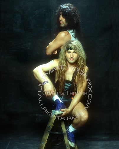 Photo of Eric Singer and Paul Stanley of Kiss during a photo shoot in 1993 by Marty Temme