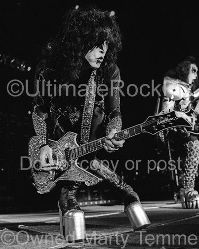 Black and white photo of Paul Stanley of Kiss in concert by Marty Temme
