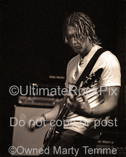 Photo of musician Josh Homme of Kyuss in concert in 1994 by Marty Temme