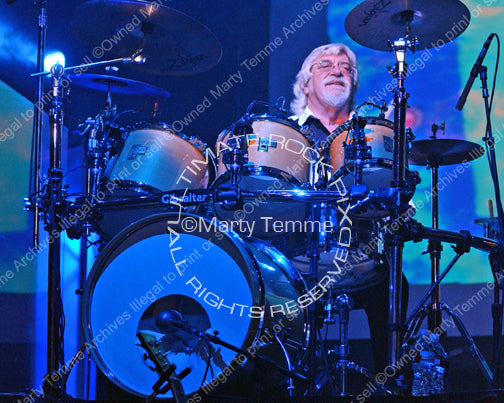 Photo of drummer Graeme Edge of The Moody Blues in concert by Marty Temme