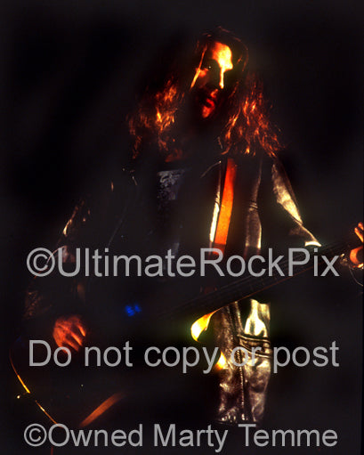 Photo of bassist Paul Barker of Ministry in concert in 1992 by Marty Temme