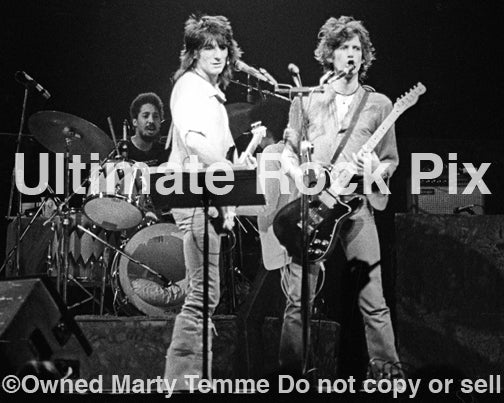 Black and white photo of Ron Wood and Keith Richards of The Rolling Stones in concert in 1979 by Marty Temme