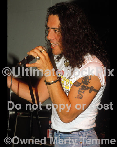 Photo of Stephen Pearcy of Ratt and Arcade in concert in 1991 by Marty Temme