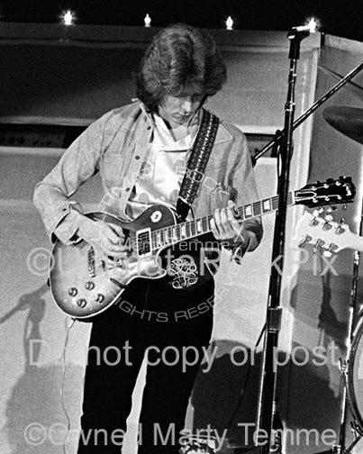Photo of guitarist Mick Taylor of The Rolling Stones in concert in 1973 by Marty Temme