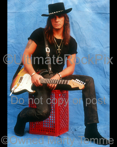 Photo of Richie Sambora with a sunburst Stratocaster during a photo shoot by Marty Temme