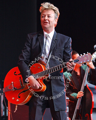 Photo of Brian Setzer of The Stray Cats in concert by Marty Temme
