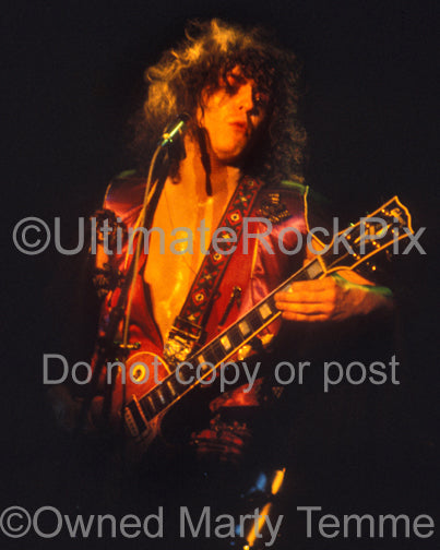 Photo of Marc Bolan of T. Rex in concert in 1973 by Marty Temme
