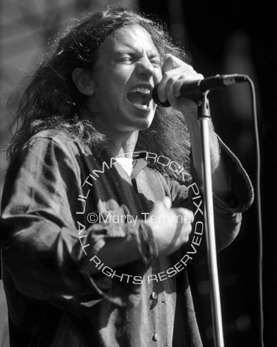 Black and white photo of Eddie Vedder of Pearl Jam in concert in 1992 by Marty Temme