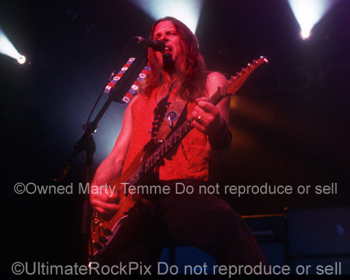 Photo of guitarist Reb Beach of Whitesnake in concert in 2003 by Marty Temme