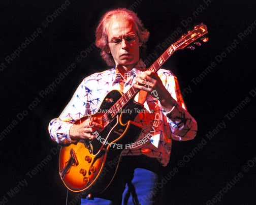 Photo of guitarist Steve Howe of Yes in concert in 2003 by Marty Temme