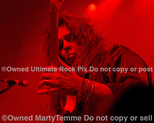Photo of Yngwie Malmsteen in concert in 2008 by Marty Temme