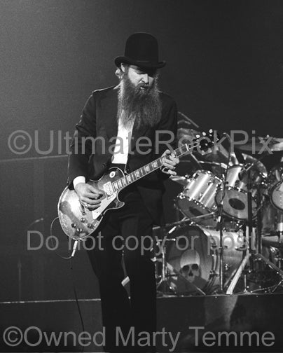 Photo of guitarist Billy Gibbons of ZZ Top playing a Gibson Les Paul onstage in 1979 by Marty Temme