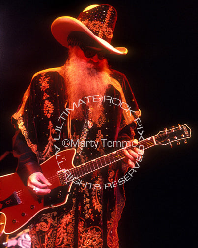 Photo of Billy Gibbons of ZZ Top playing a Billy-Bo Jupiter Thunderbird onstage in 2003 by Marty Temme