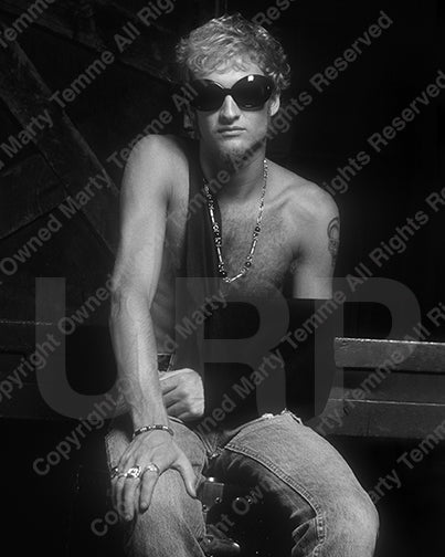 Black and white photo of Layne Staley of Alice in Chains wearing sunglasses during a photo shoot in 1991 by Marty Temme