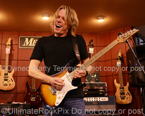Photo of guitar player Andy Timmons performing in 2011 by Marty Temme