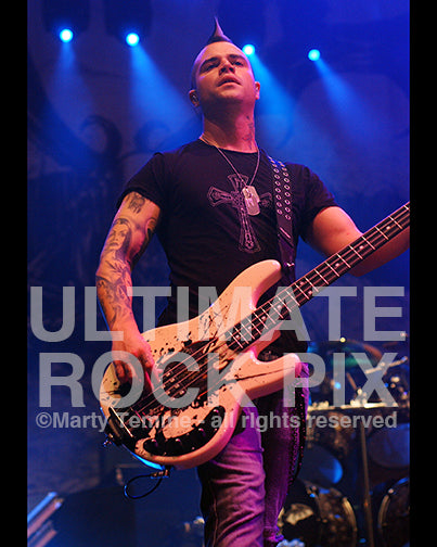 Photo of bass player Johnny Christ of Avenged Sevenfold in concert by Marty Temme