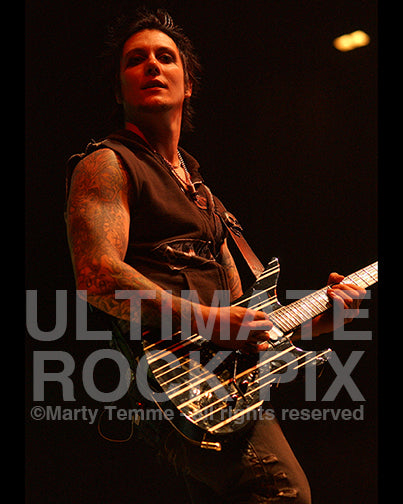 Photo of Synyster Gates of Avenged Sevenfold in concert by Marty Temme