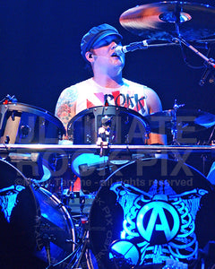 Photo of drummer and singer Brandon Saller of Atreyu in concert in 2008 by Marty Temme