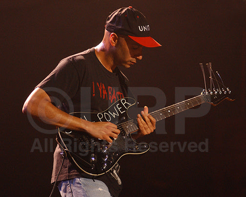 Photo of guitarist Tom Morello in concert by Marty Temme