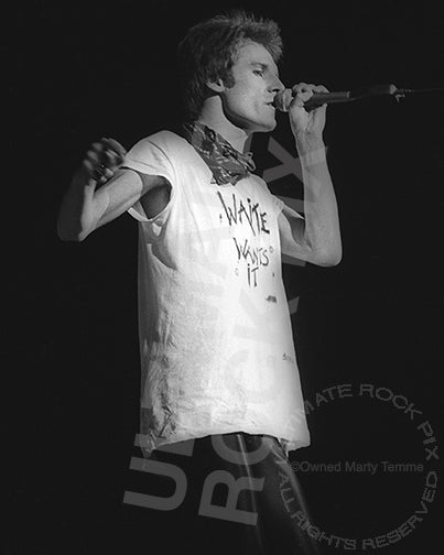 Black and white photo of John Waite of The Babys performing in concert in 1980 by Marty Temme