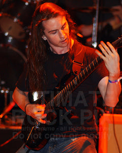 Photo of guitar player Jason Richardson in concert by Marty Temme