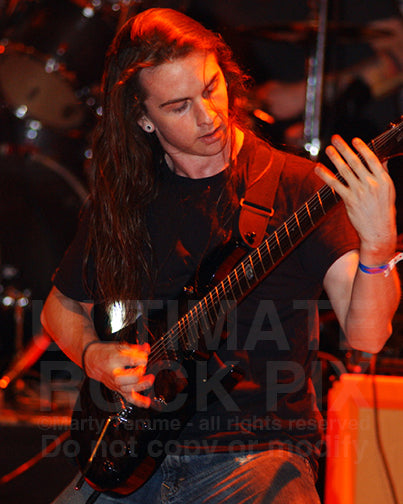 Photo of guitar player Jason Richardson in concert by Marty Temme
