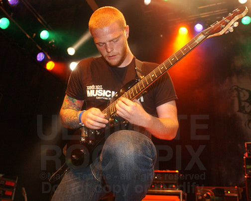Photo of guitar player Lee McKinney of Born of Osiris in concert by Marty Temme