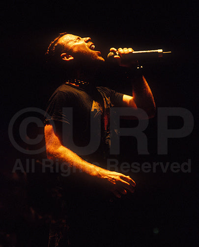 Photo of John Bush of Anthrax in concert in 2001 by Marty Temme