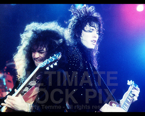 Photo of Tom Keifer and Jeff LaBar of Cinderella in concert in 1989 by Marty Temme