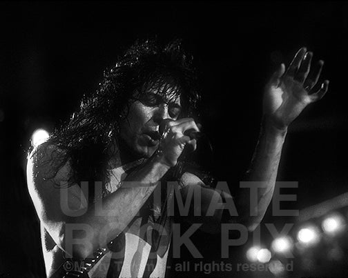 Black and white photo of Tom Keifer of Cinderella singing in concert in 1989 by Marty Temme